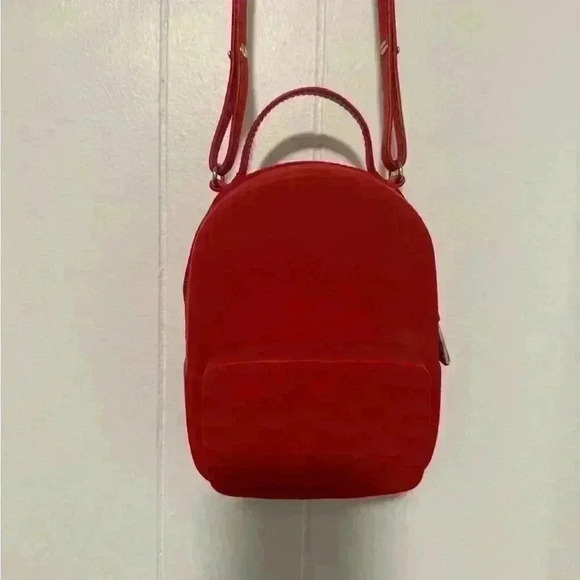 Miniso Handbags - Miniso red silicone crossbody bag used like a new
